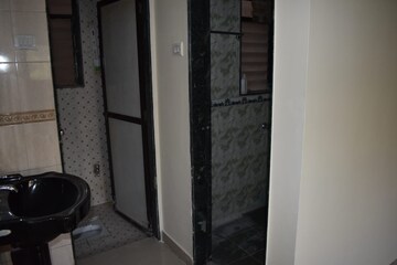 Bathroom in 2 BHK Apartment at Saurabh CHS Karve Nagar, Karve Nagar – for Rent
