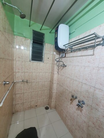 Bathroom in 1 BHK Apartment at Nirman Nisarga, Bhusari Colony – for Rent