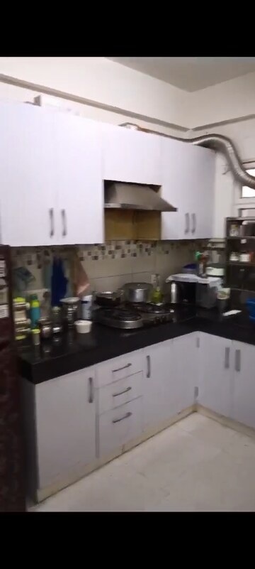 Kitchen in 2 BHK Apartment at Signature Global Orchard Avenue, Sector 93 – for Rent