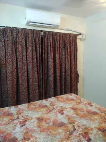 Bedroom in 2 BHK Apartment at Maharaja Retreat CHS, Goregaon East – for Rent