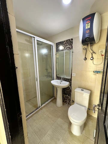 Bathroom in 2 BHK Apartment at Paramount Symphony, Sain Vihar – for Sale