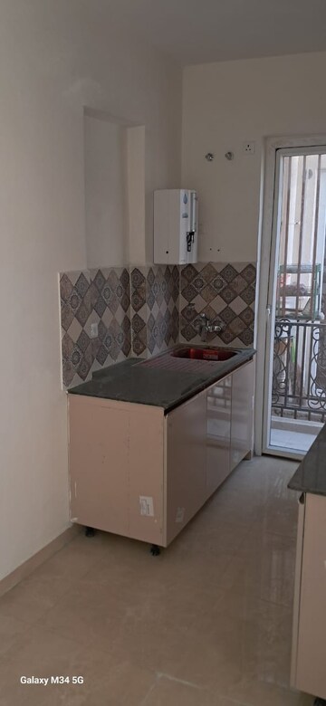 Kitchen in 3 BHK Builder Floor at Signature Global Park 4 and 5, Sohna Sector 36 – for Rent