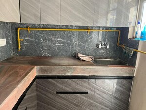 Kitchen in 3 BHK Apartment at MGI Gharaunda, Raj Nagar Extension – for Sale