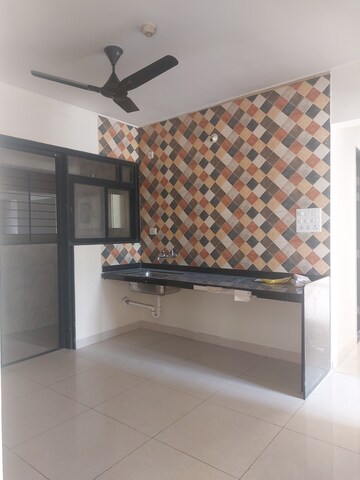 Kitchen in 2 BHK Apartment at Sargam CHS Nanded, Sinhagad Road – for Rent