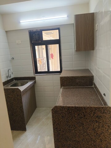Kitchen in 2 BHK Apartment at Chandiwala Pearl Heaven, Andheri East – for Rent