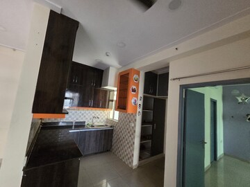 Kitchen in 2 BHK Apartment at Gaur City 2 - 12th Avenue, Sector 16c Greater Noida – for Rent