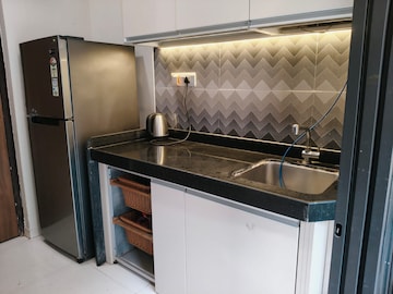 Kitchen in 1 BHK Apartment at Raunak Heights, Ghodbunder Road – for Rent