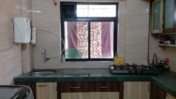Kitchen in 1 BHK Apartment at Raunak Heights, Ghodbunder Road – for Rent