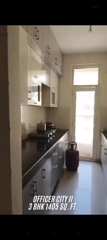 Kitchen in 3 BHK Apartment at Proview Officer City 2, Raj Nagar Extension – for Sale