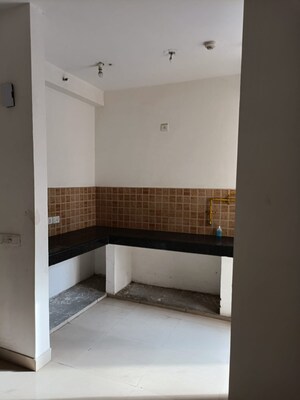 Kitchen in 2.5 BHK Apartment at Mahagun Mywoods, Sector 16c Greater Noida – for Sale