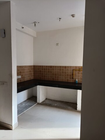 Kitchen in 2.5 BHK Apartment at Mahagun Mywoods, Sector 16c Greater Noida – for Sale