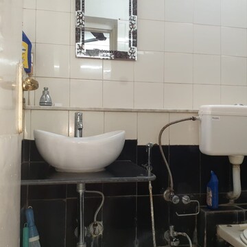 Bathroom in 2 BHK Apartment at Maharaja Retreat CHS, Goregaon East – for Rent