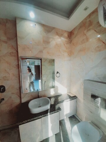 Bathroom in 2 BHK Apartment at MGI Gharaunda, Raj Nagar Extension – for Sale