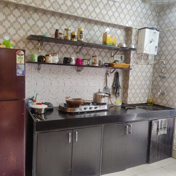 Kitchen in 2 BHK Apartment at Maharaja Retreat CHS, Goregaon East – for Rent