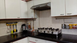 Kitchen in 1 BHK Apartment at Vijay Garden, Ghodbunder Road – for Sale