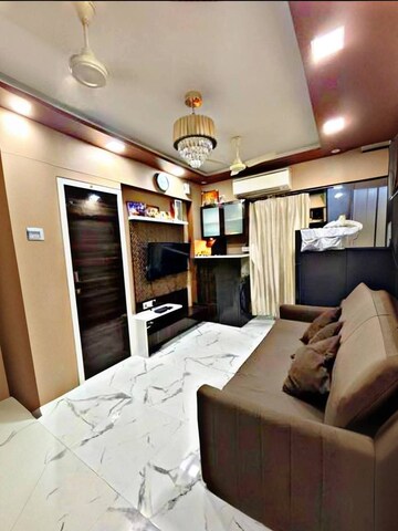 Living Room in 1 BHK Apartment at Ruparel Sereno, Vasai East – for Sale