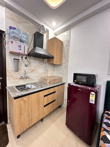 Kitchen in 1 BHK Builder Floor at Ansal Plaza Sector-23, Sector 23 – for Rent