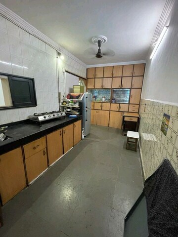 Kitchen in 2 BHK Apartment at Madav Kunj Apartment, Vile Parle East – for Rent