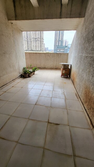 Terrace in 1 BHK Apartment at Velocity Hill Spring, Ghodbunder Road – for Rent