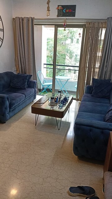 Living Room in 2 BHK Apartment at Satellite Garden, Goregaon East – for Rent