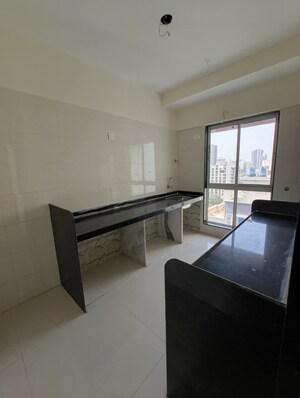 Kitchen in 3 BHK Apartment at Agarwal And Doshi Complex, Vasai West – for Sale