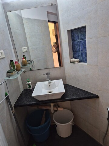 Bathroom in 1 BHK Apartment at Vasant Valley Complex, Malad East – for Rent