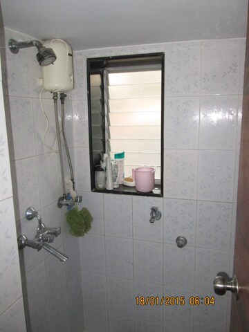 Bathroom in 1 BHK Apartment at Nishant Building, Andheri West – for Rent