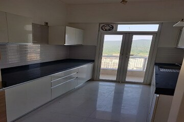 Kitchen in 4 BHK Apartment at Omkar Alta Monte, Malad East – for Sale