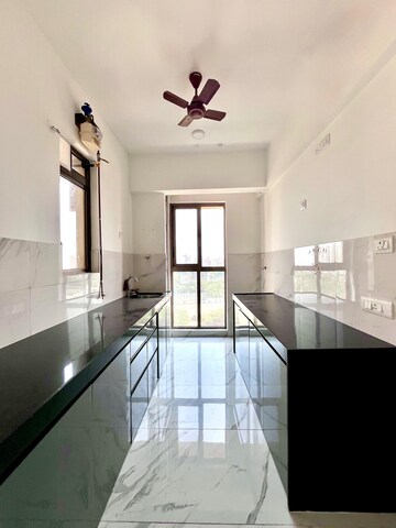 Kitchen in 2 BHK Apartment at Raymond Ten X Habitat, Pokhran Road No Two – for Rent