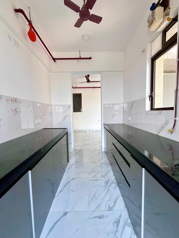 Kitchen in 2 BHK Apartment at Raymond Ten X Habitat, Pokhran Road No Two – for Rent