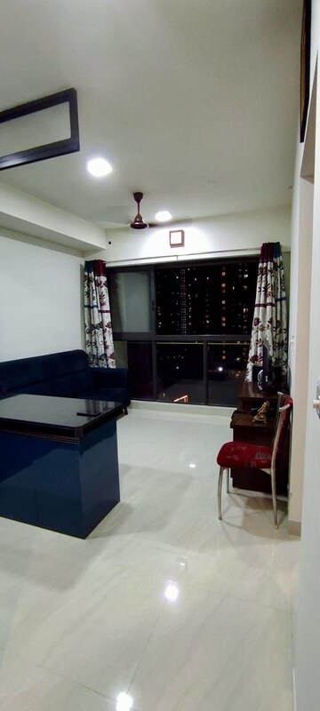 Living Room in 1 BHK Apartment at Lodha Crown Quality Homes, Majiwada – for Rent
