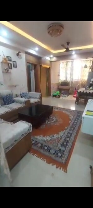 Living Room in 2 BHK Apartment at Uninav Heights Phase I, Raj Nagar Extension – for Sale