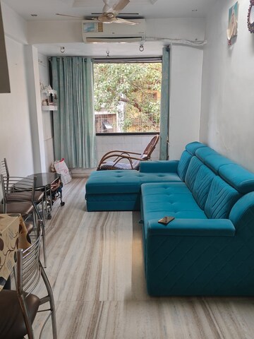 Living Room in 1 BHK Apartment at Khar West – for Rent