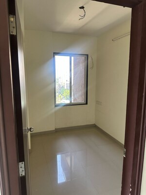 Room in 2.5 BHK Apartment at Navnit CHS, Andheri West – for Sale