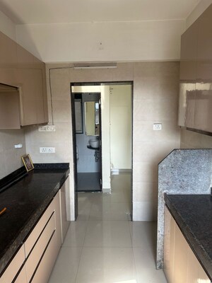 Kitchen in 2.5 BHK Apartment at Navnit CHS, Andheri West – for Sale