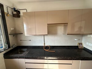 Kitchen in 2.5 BHK Apartment at Navnit CHS, Andheri West – for Sale