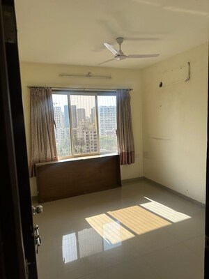 Bedroom in 2.5 BHK Apartment at Navnit CHS, Andheri West – for Sale