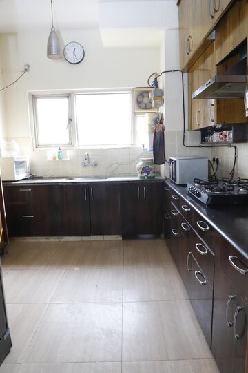 Kitchen in 2 BHK Apartment at Gaur City 2 - 14th Avenue, Sector 16c Greater Noida – for Rent