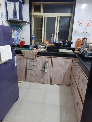 Kitchen in 1 BHK Apartment at Roop CHS, Nalasopara West – for Sale