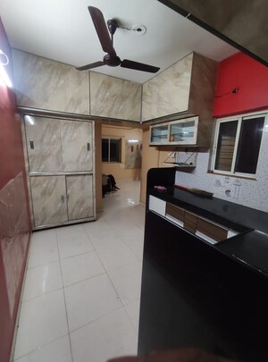 Kitchen in 2 BHK Apartment at Manik Moti, Satara Road – for Sale