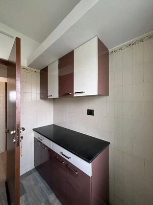 Kitchen in 1 BHK Apartment at Mukti Vaibhav CHS, Nalasopara West – for Sale