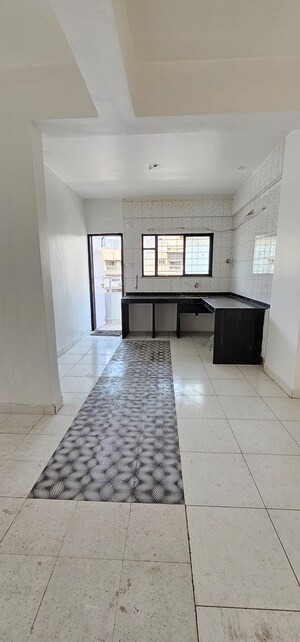 Kitchen in 2 BHK Apartment at Gagan Vihar, Market Yard – for Sale