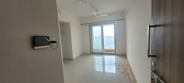 Living Room in 1 BHK Apartment at Ashar Axis, Majiwada – for Rent
