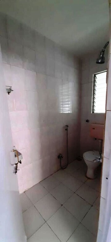 Bathroom in 3 BHK Apartment at Nirmiti Sanket, Paud Road – for Rent