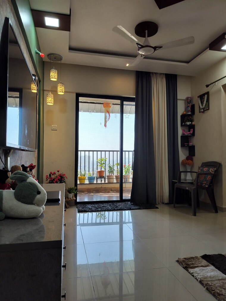 Living Room, jalan-neo-city 1 Bedroom 500 Sq.Ft. Apartment In Wagholi Pune 8533151