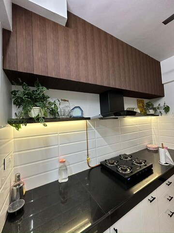 Kitchen in 2 BHK Apartment at Ani Anu Sri Balaji Enclave, Malad West – for Sale
