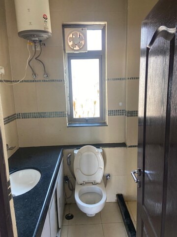 Bathroom in 2 BHK Apartment at Unitech Uniworld Gardens, Sector 47 – for Rent