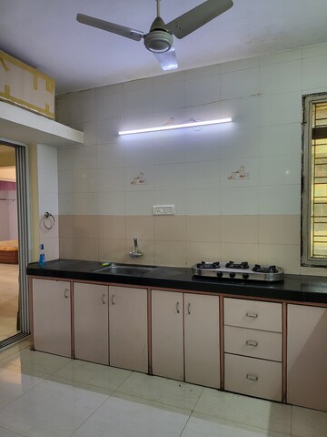 Kitchen in 3 BHK Apartment at Amli Ind Estate – for Rent