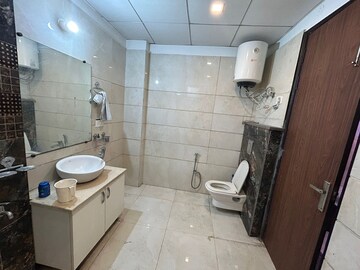 Bathroom in 4 BHK Builder Floor at Niti Khand I – for Rent