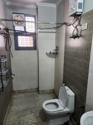 Bathroom in 3 BHK Builder Floor at Niti Khand I – for Rent